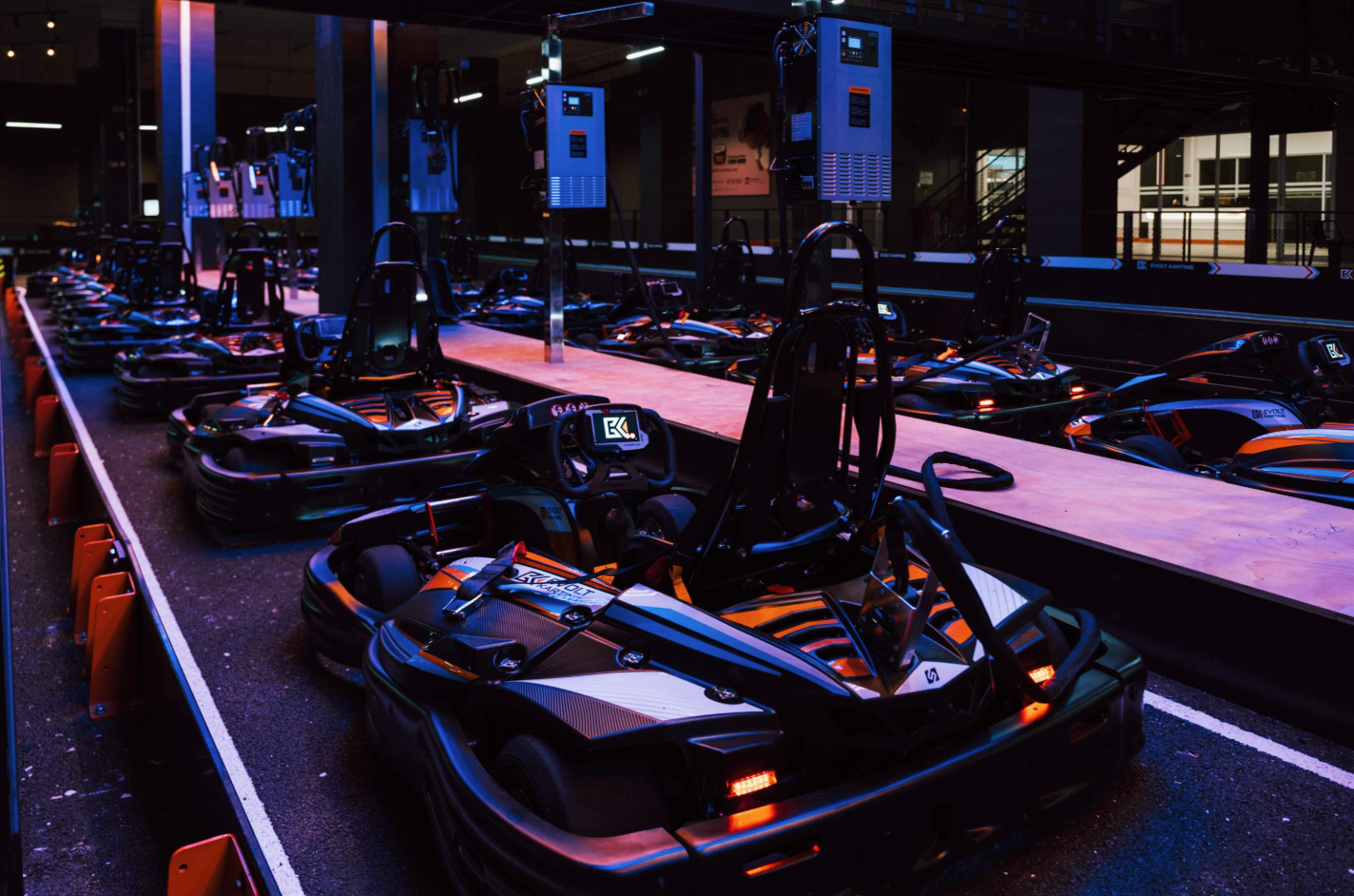 Sleek electric go-karts on an indoor track